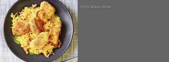Rezeptbild für "Curry-Sauerkraut mit Kokos-Hähnchen-Nuggets"