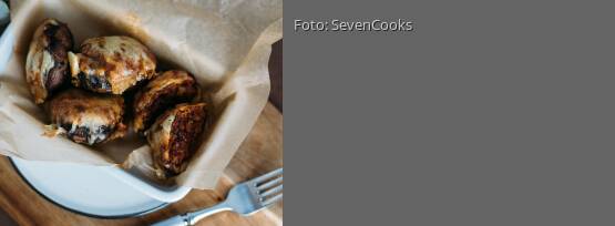 Rezeptbild für "Gratinierte Champignons mit Tomaten-Walnussfüllung"