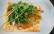 Vegetarisches Rezept: Kürbis-Flammkuchen mit Rucola-Haube